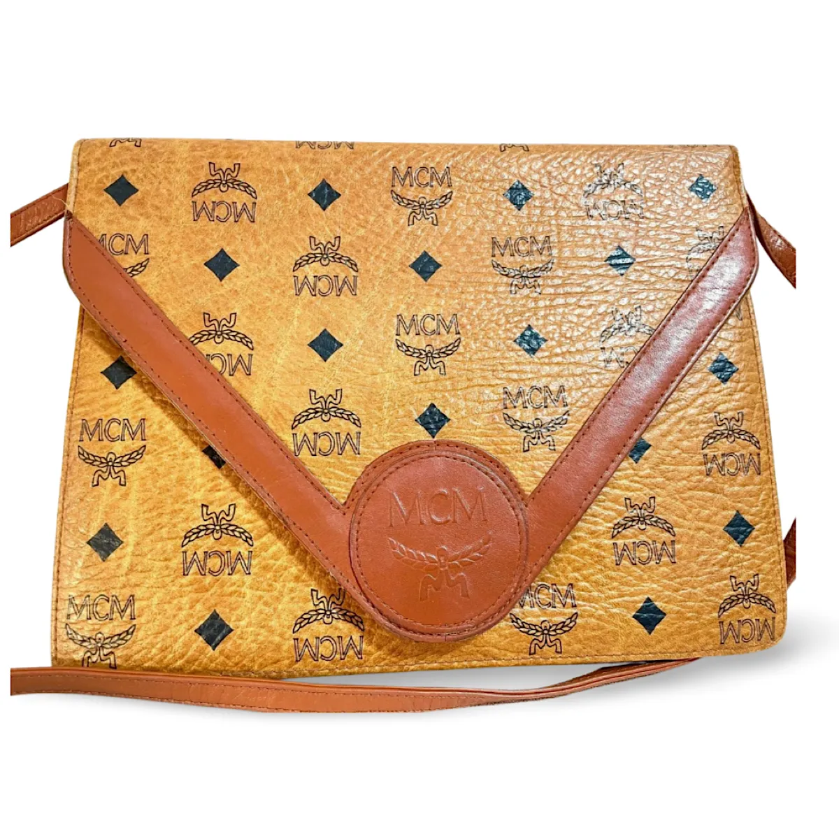 1990s. Vintage MCM brown monogram shoulder bag in envelop design. Designed by Michael Cromer. Can be a clutch bag too. 061217ac2