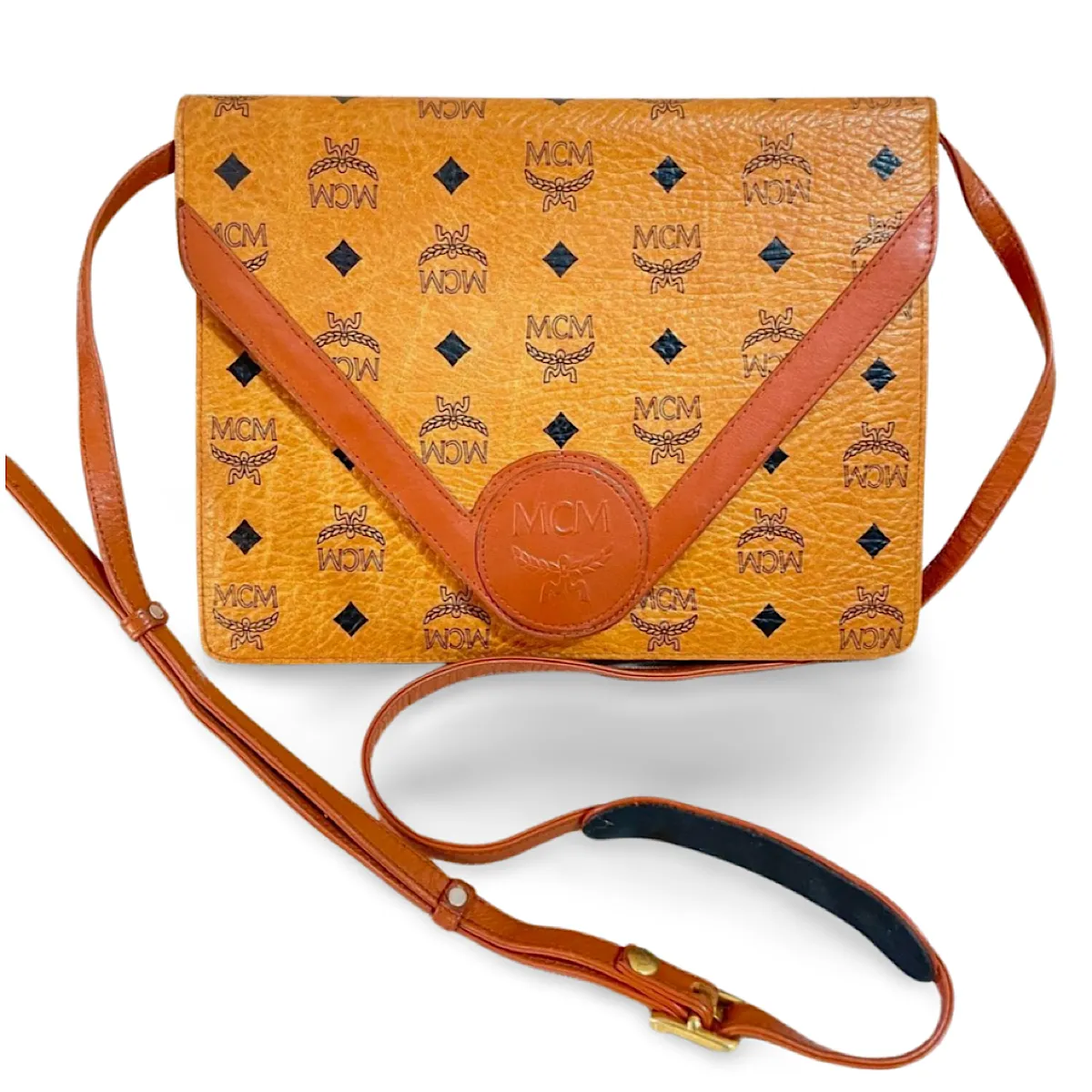 1990s. Vintage MCM brown monogram shoulder bag in envelop design. Designed by Michael Cromer. Can be a clutch bag too. 061217ac2