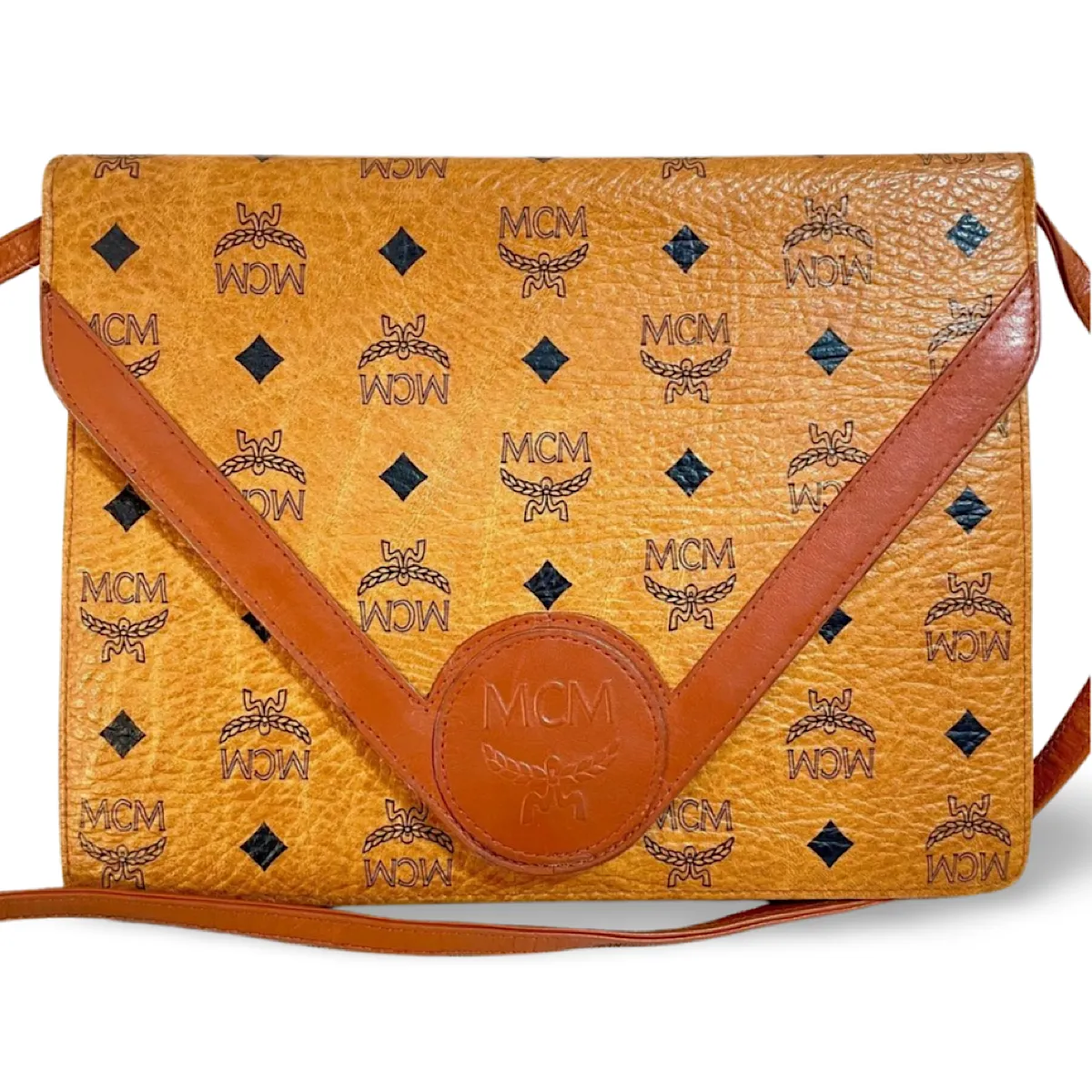 1990s. Vintage MCM brown monogram shoulder bag in envelop design. Designed by Michael Cromer. Can be a clutch bag too. 061217ac2