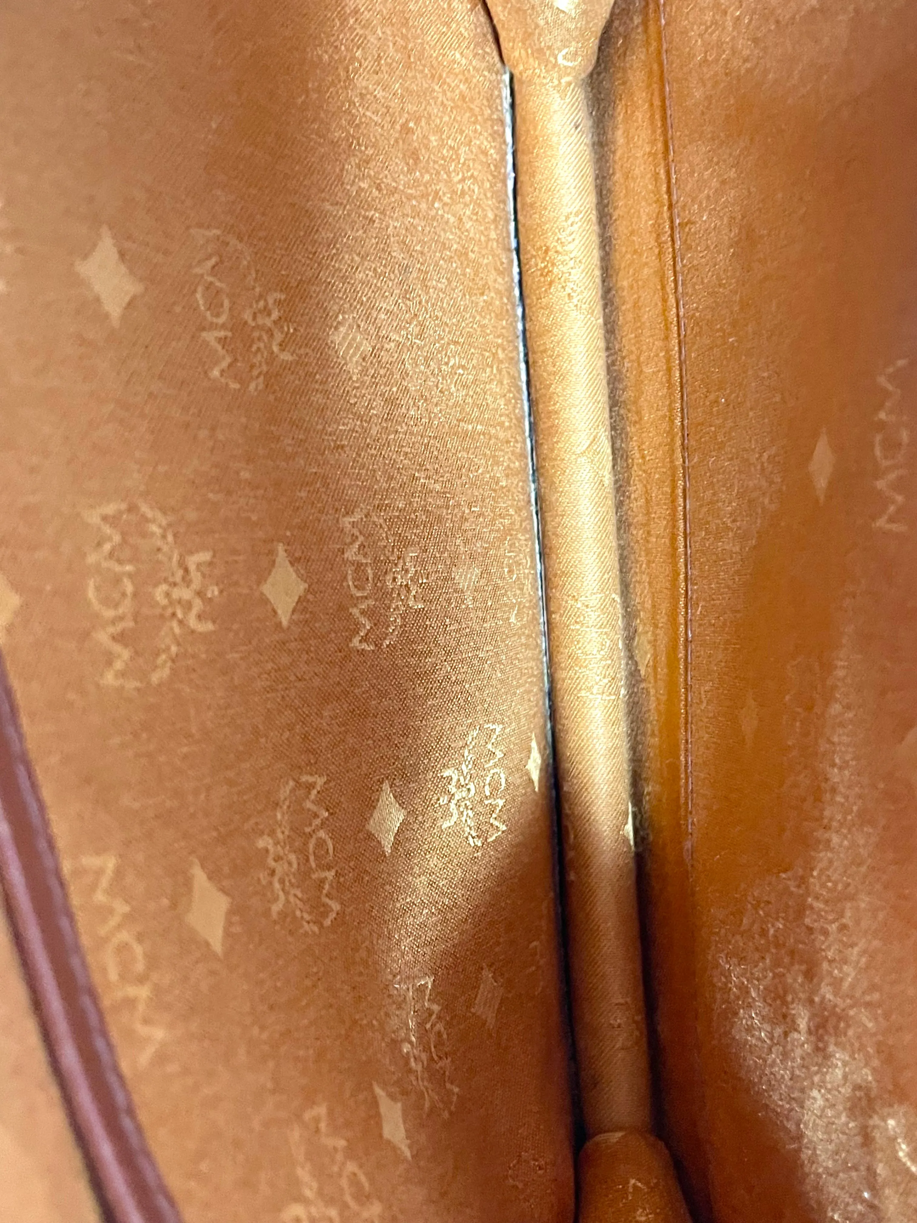 1990s. Vintage MCM brown monogram shoulder bag in envelop design. Designed by Michael Cromer. Can be a clutch bag too. 061217ac2