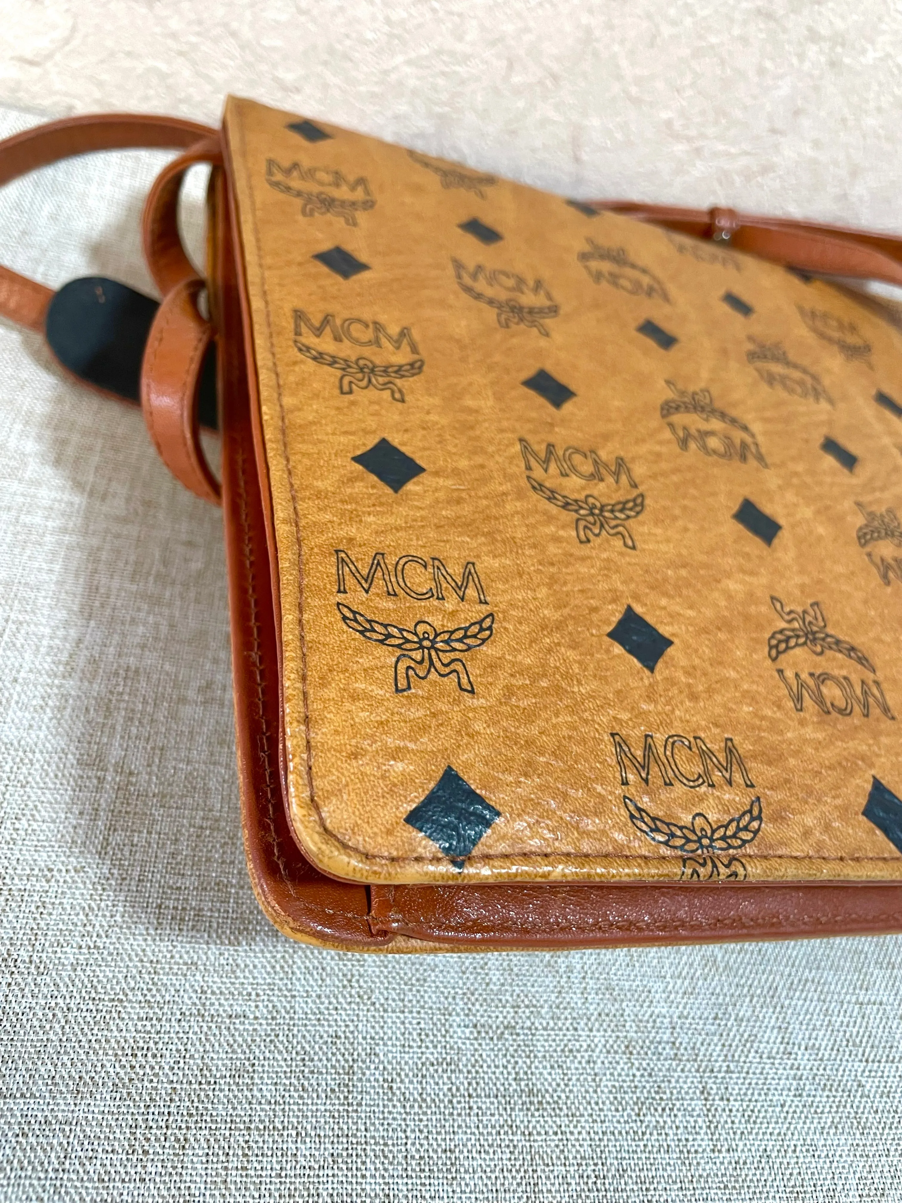 1990s. Vintage MCM brown monogram shoulder bag in envelop design. Designed by Michael Cromer. Can be a clutch bag too. 061217ac2